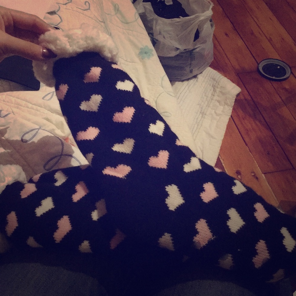 Fuzzy socks with plastic beads on bottom
